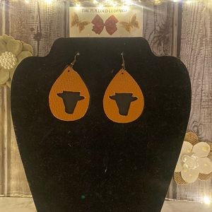 Handmade faux leather earrings.